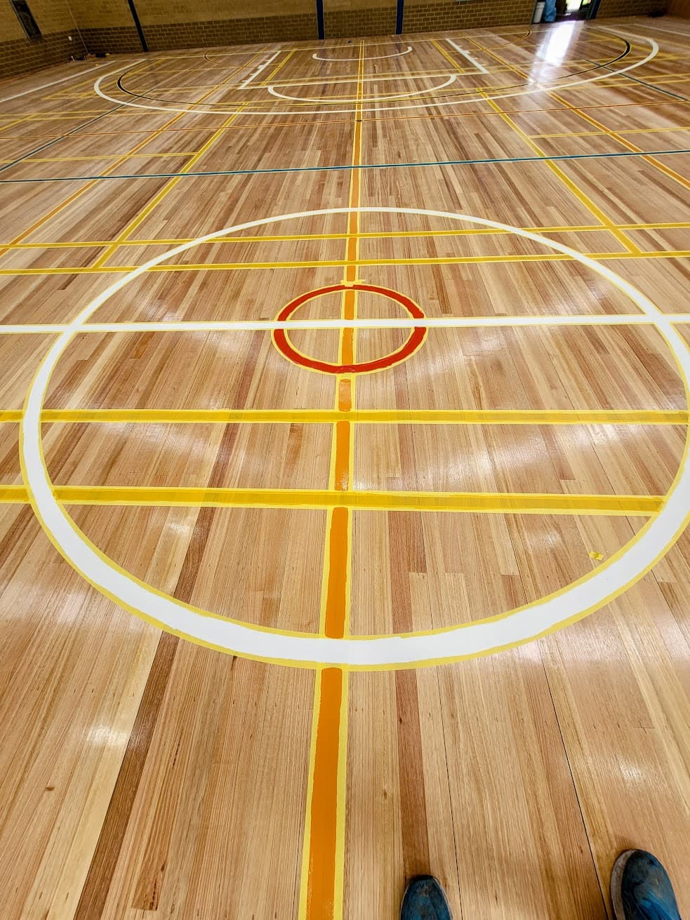 Professional sports floor sanding and finishing process